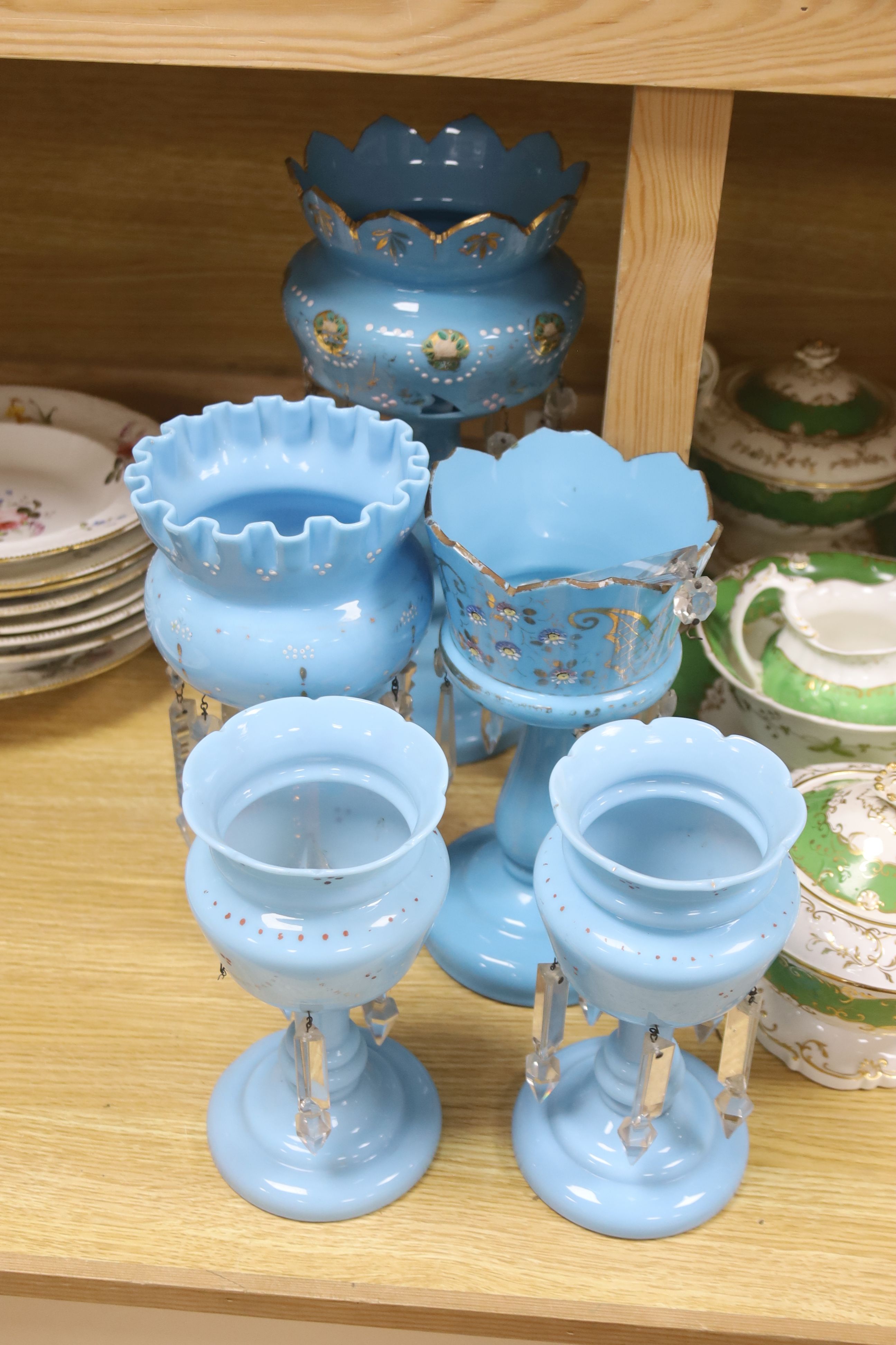 A matched set of five blue glass table lustres, 20th century, tallest 35cm